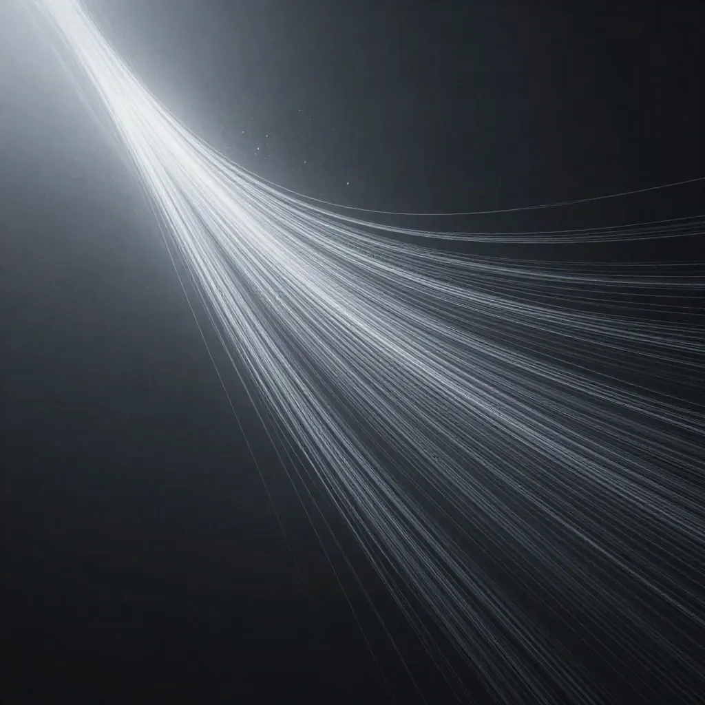 Silver filaments converge into a soft bloom in a dark graphite void with drifting haze.